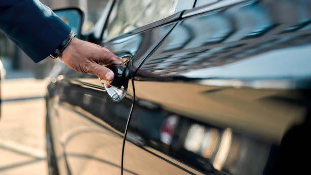 A person is about to enter a black car, opening the door handle, associated with Right Black Car Rental Service.